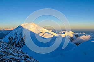 Ibn Sina Avicenna or Lenin peak at Pamir mountains cold snow ice glacier