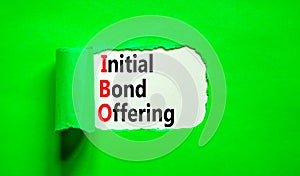 IBO initial bond offering symbol. Concept words IBO initial bond offering on beautiful white paper. Beautiful green paper