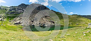 Ibon of Espelunciecha in summer, glacial lake in the aragonese Pyrenees