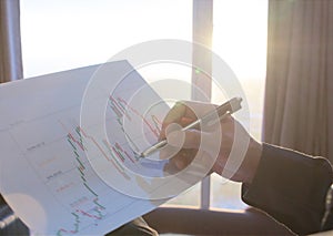 ibonacci indicator analysis concept, Business man analyzing stock graph chart
