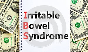 IBS irritable bowel syndrome symbol. Concept words IBS irritable bowel syndrome on white note on a beautiful background from