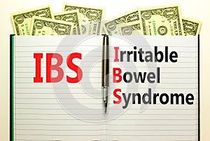 IBS irritable bowel syndrome symbol. Concept words IBS irritable bowel syndrome on white note on a beautiful white background.