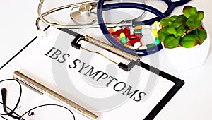 IBS SYMTOMS text and Background of Medicaments, Stethoscope