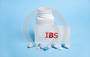 IBS text Irritable Bowel Syndrome on wooden cubes