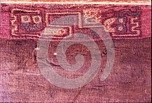 Ica paracas Peru with details of textil figure mithical, being horrible bird, mithical killer ,