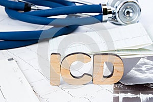 ICD Acronym or abbreviation to implantable cardioverter defibrillator as device that monitors heart rhythm problems. Word ICD is a photo