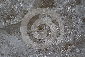 Ice background with marks from skating and hockey. Ice hockey rink scratches surface