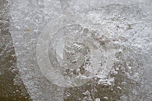 Ice background with marks from skating and hockey. Ice hockey rink scratches surface