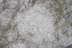 Ice background with marks from skating and hockey. Ice hockey rink scratches surface