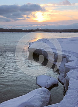 Ice on the Bank of the Ob at sunrise - vertically