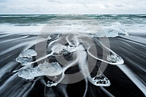 Ice on the beach with black sand in Iceland