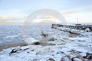 Ice on the beach and quay