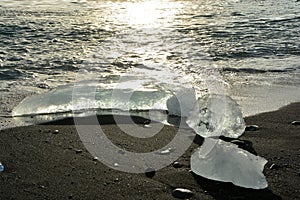 Ice on the black sand beach nearby the most visited JÃ¶kulsarlon glacier lagoon