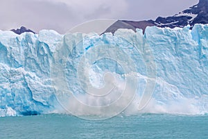 Ice blocks falling from the Glacier Perito Moreno in Patagonia, Argentina