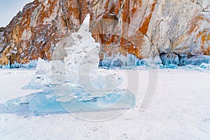 Ice blocks in front of rock island in Lake Baikal