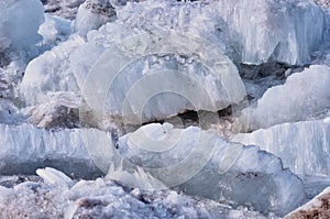 Ice blocks melt and disintegrate into needles.