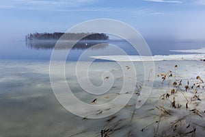 Ice breakup on the lake HjÃÂ¤lmaren, Hampetorp, Sweden photo