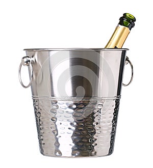 Ice bucket with champagne bottle isolated on white