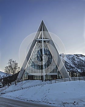 Ice cathedral in Tromso in Norway covered by snpw