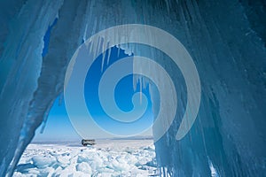 Ice cave in Baikal frozen lake in winter season, Siberia, Russia