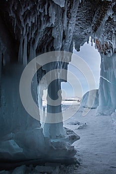 Ice cave, Icicles in the rocky caves, Lake Baikal in winter, Siberia