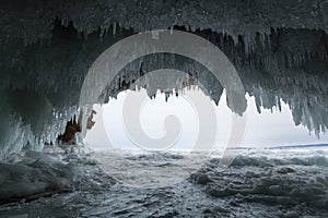 Ice cave on island Olkhon at Baikal Lake