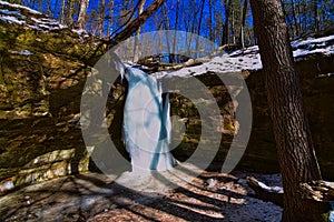 Ice cave trail  rock frozen waterfall wildcat mountain state park in Winter