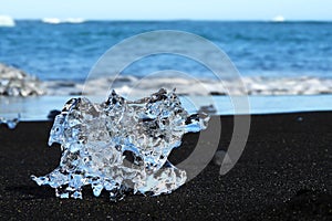 Ice Chunk Scattered on Black Sand at Diamond Beach in Iceland