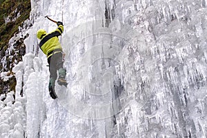 Ice climber with ice axe