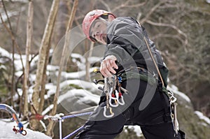 Ice climber rappelling