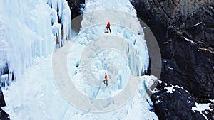 Ice climbing at frozen waterfall.