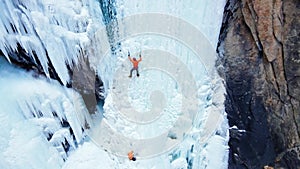 Ice climbing at frozen waterfall.