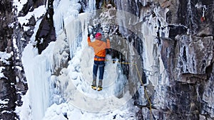 Ice climbing at frozen waterfall.