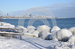 Ice coated shoreline and Toronto skyline