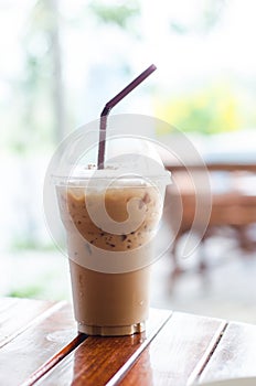 Ice coffee on wood table
