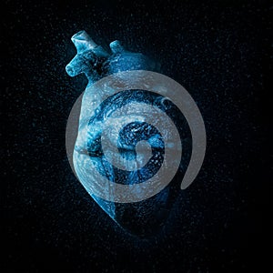 An ice cold blue heart Over black