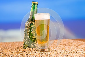 Ice cold green unlabelled bottle of beer in the