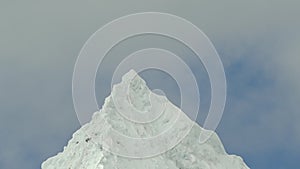 ice covered glacier of pyramid shaped mountain, laguna paron
