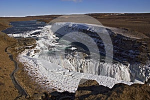 Ice covered Golden Falls, Gullfoss waterfall, Iceland.