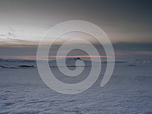 Ice covered mountains in North Western island