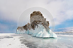 Ice-covered Ogoy Island in the Maloye More Bay of Lake Baikal in winter. Siberia, Russia