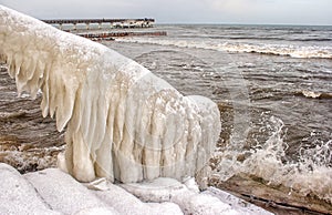 Ice covered staircase on the beach
