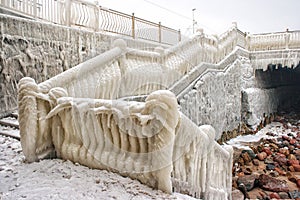 Ice covered staircase on the beach