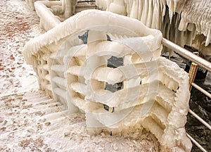 Ice covered staircase on the beach