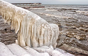 Ice covered staircase on the beach