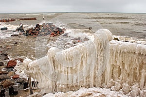 Ice covered staircase on the beach