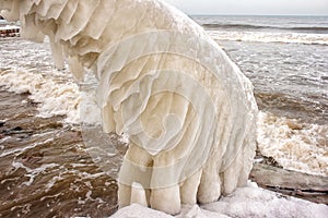 Ice covered staircase on the beach