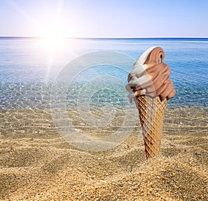 Ice cream on the beach by the sea in hot days of the summer