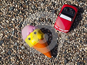 Ice-cream car toy beach stone