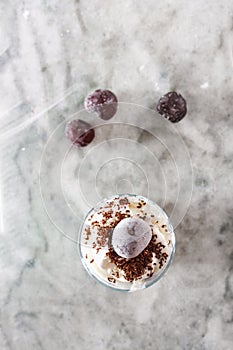 Ice cream with cherry berries on beautiful marble countertop background